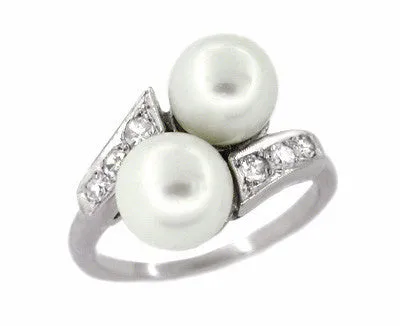 1950's Retro Pearl and Diamond Vintage Bypass Ring in 14 Karat White Gold