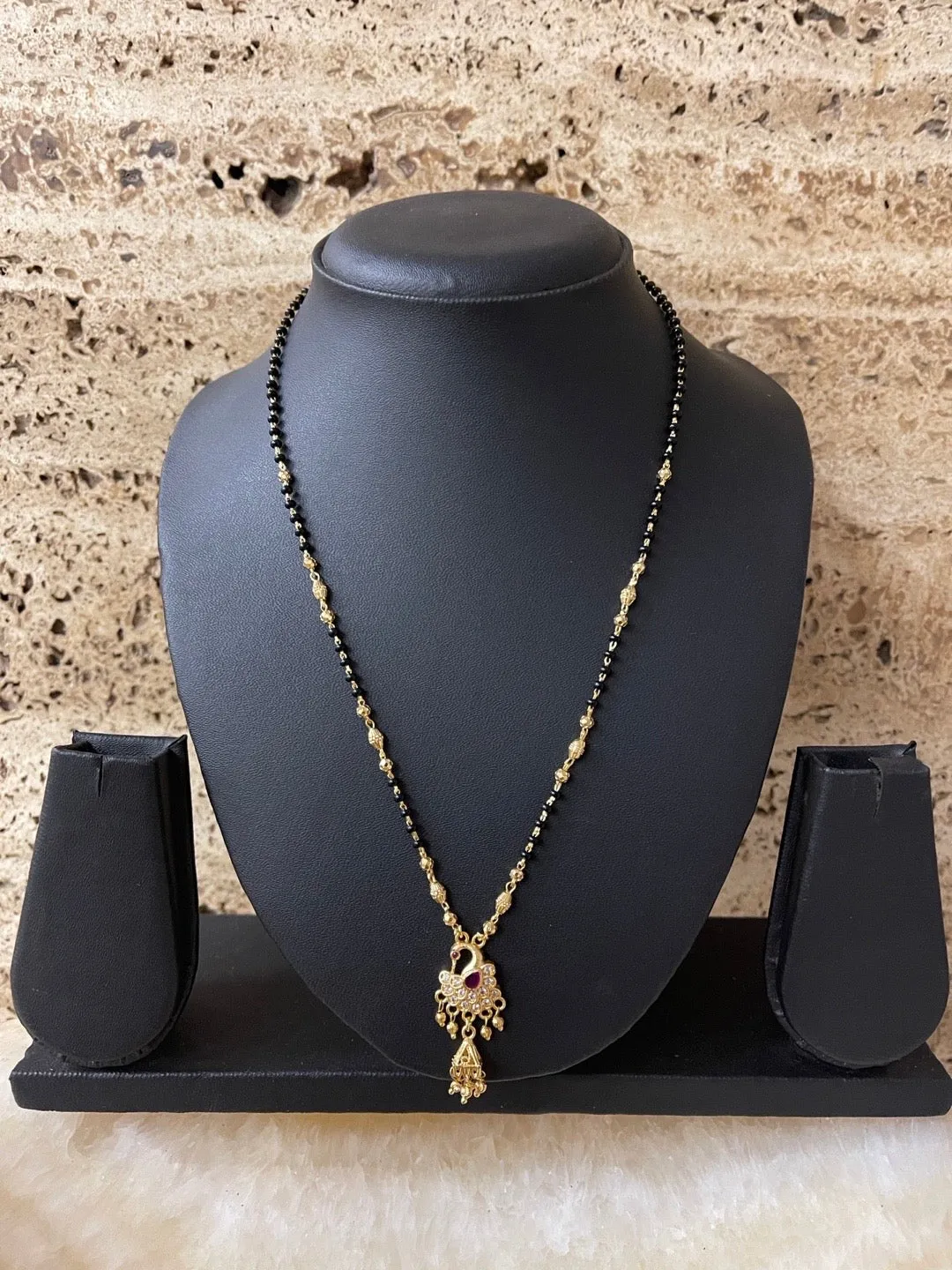 Artificial American Diamond Short Gold Mangalsutra Designs Peacock Pendant Gold & Black Beads Chain