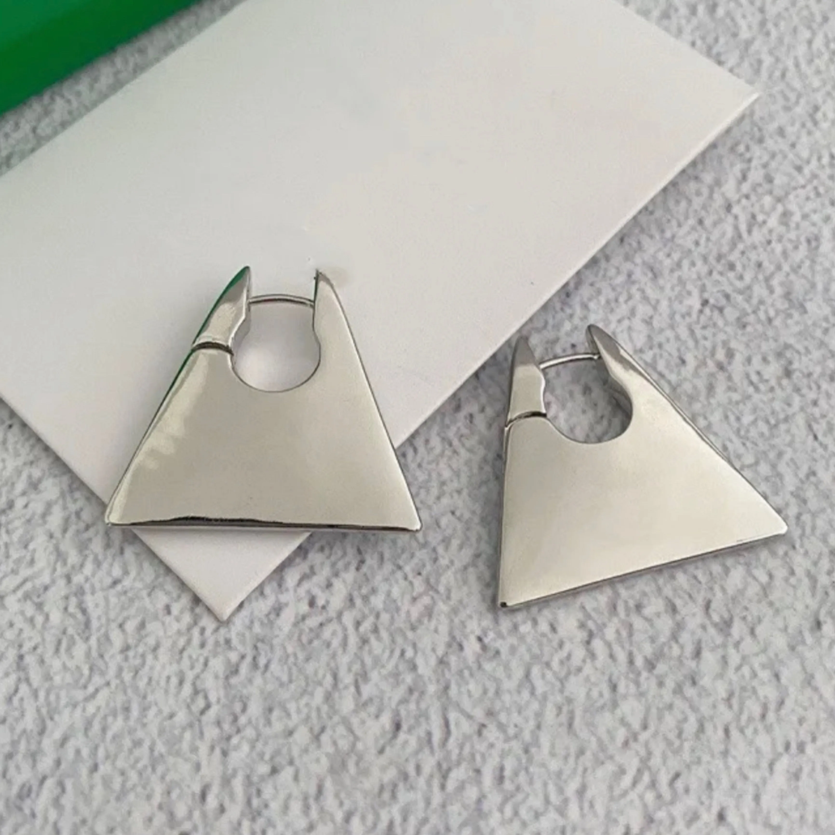 Chunky Triangle Huggie Earrings - Gold and Silver.