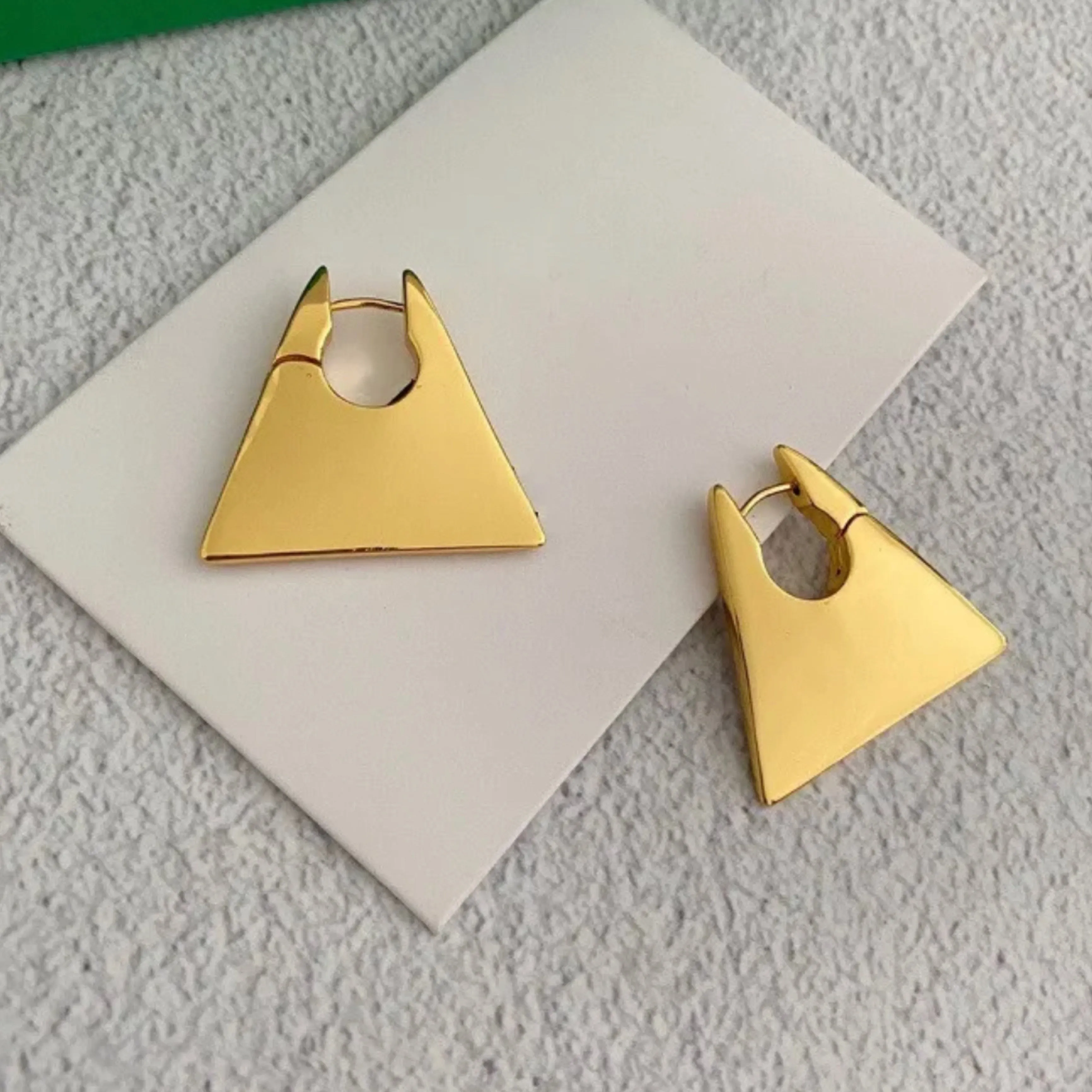 Chunky Triangle Huggie Earrings - Gold and Silver.