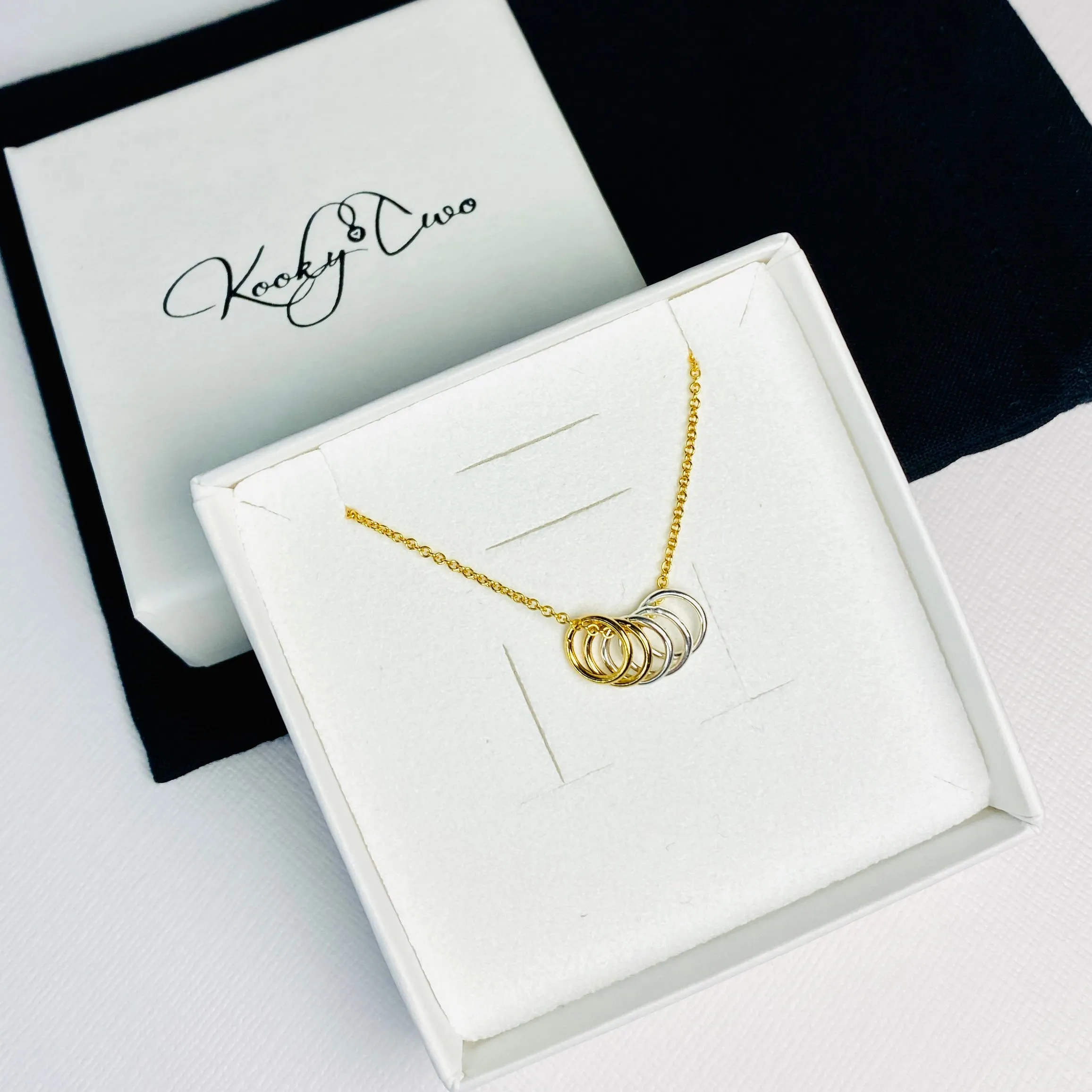 Gold Necklace with Silver and Gold Rings