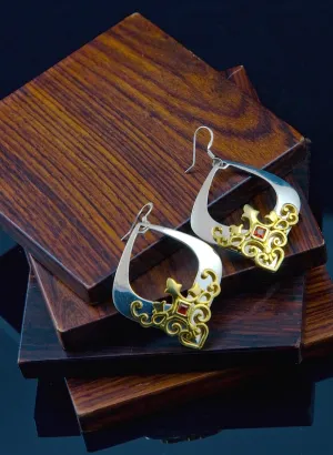Gorgeous, kite-shape earrings with garnet and gold plated detailing