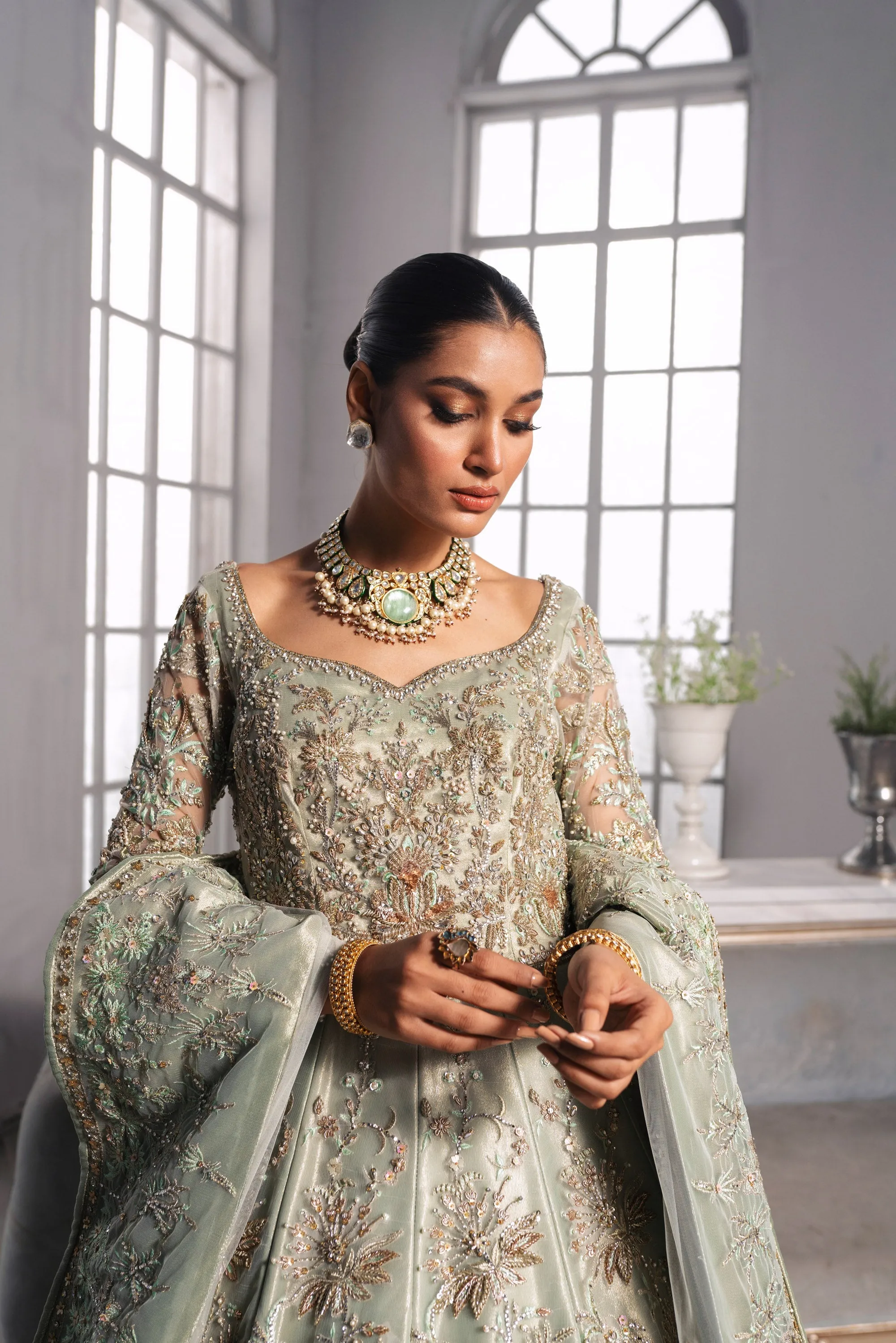 Gown Style Pakistani Bridal Dress in Mint Green Color