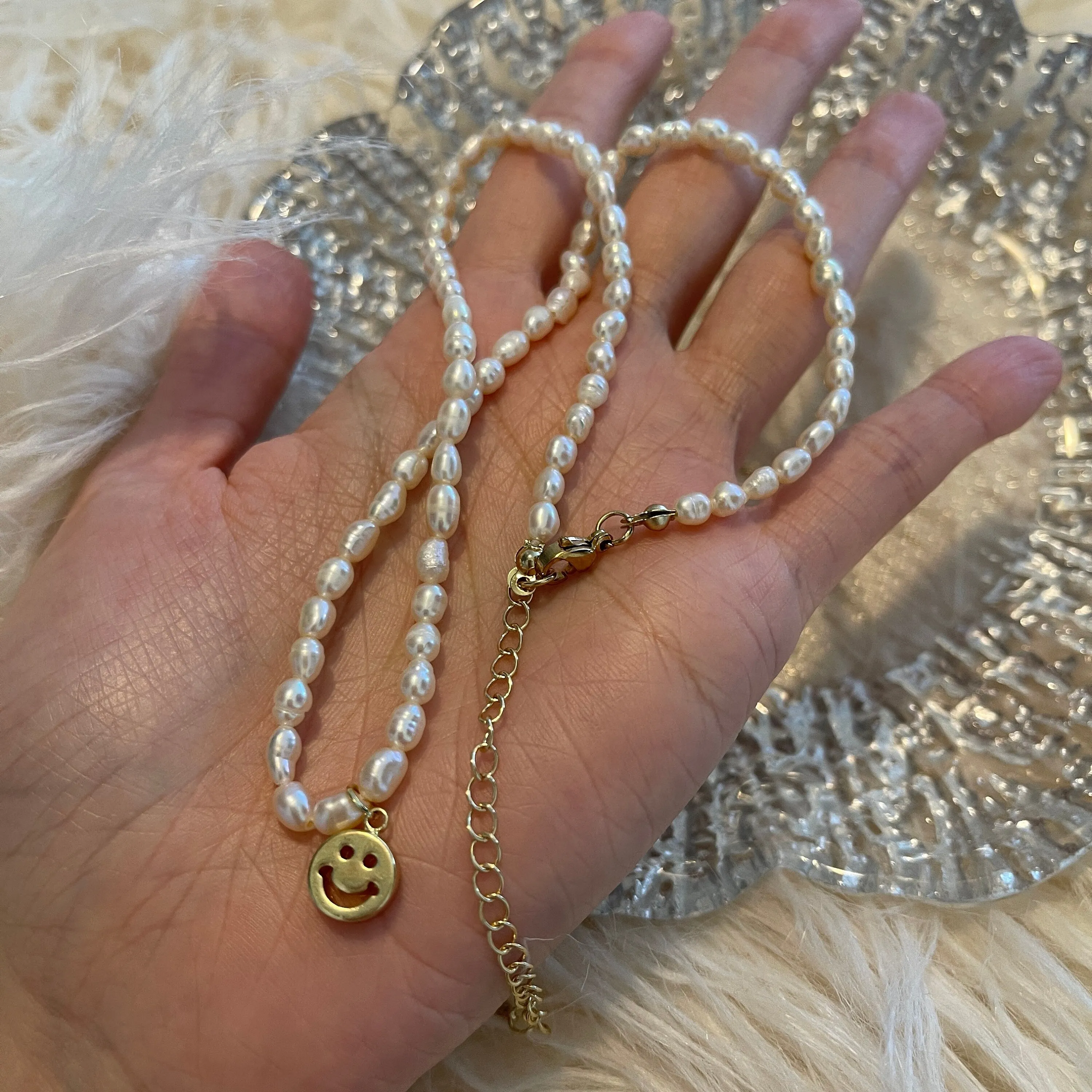 Natural pearl choker with charm