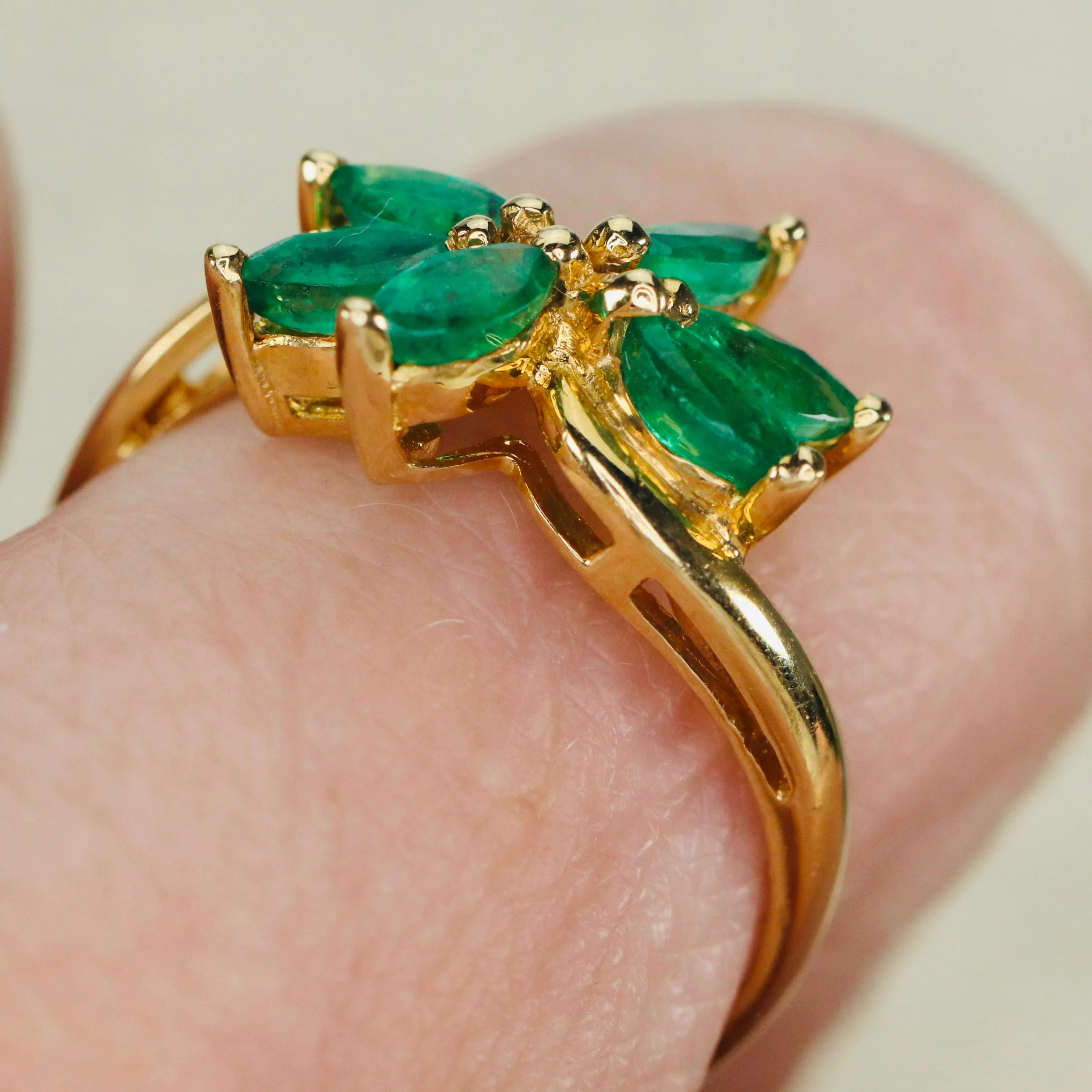 Vintage emerald twisted cluster ring in 14k yellow gold