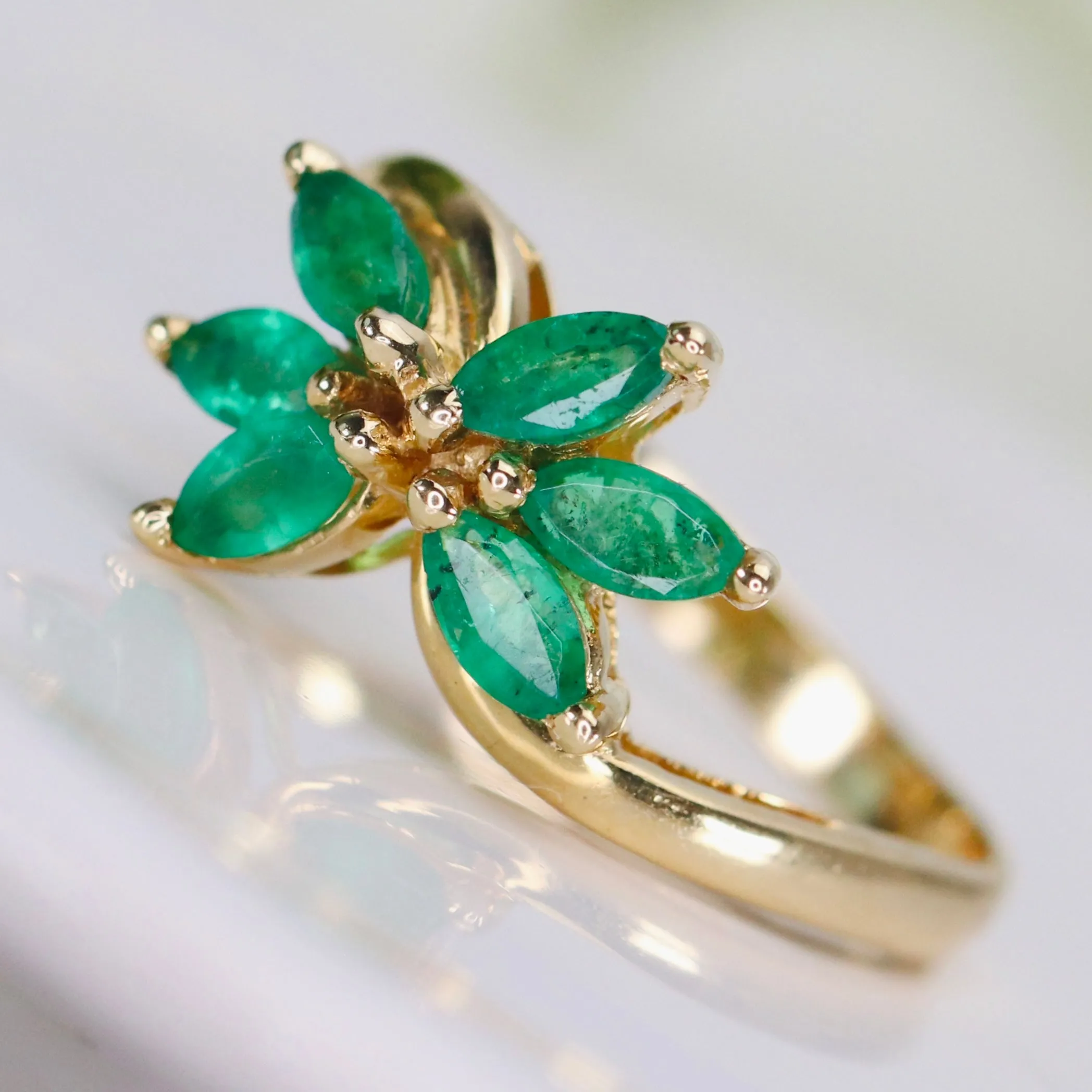 Vintage emerald twisted cluster ring in 14k yellow gold