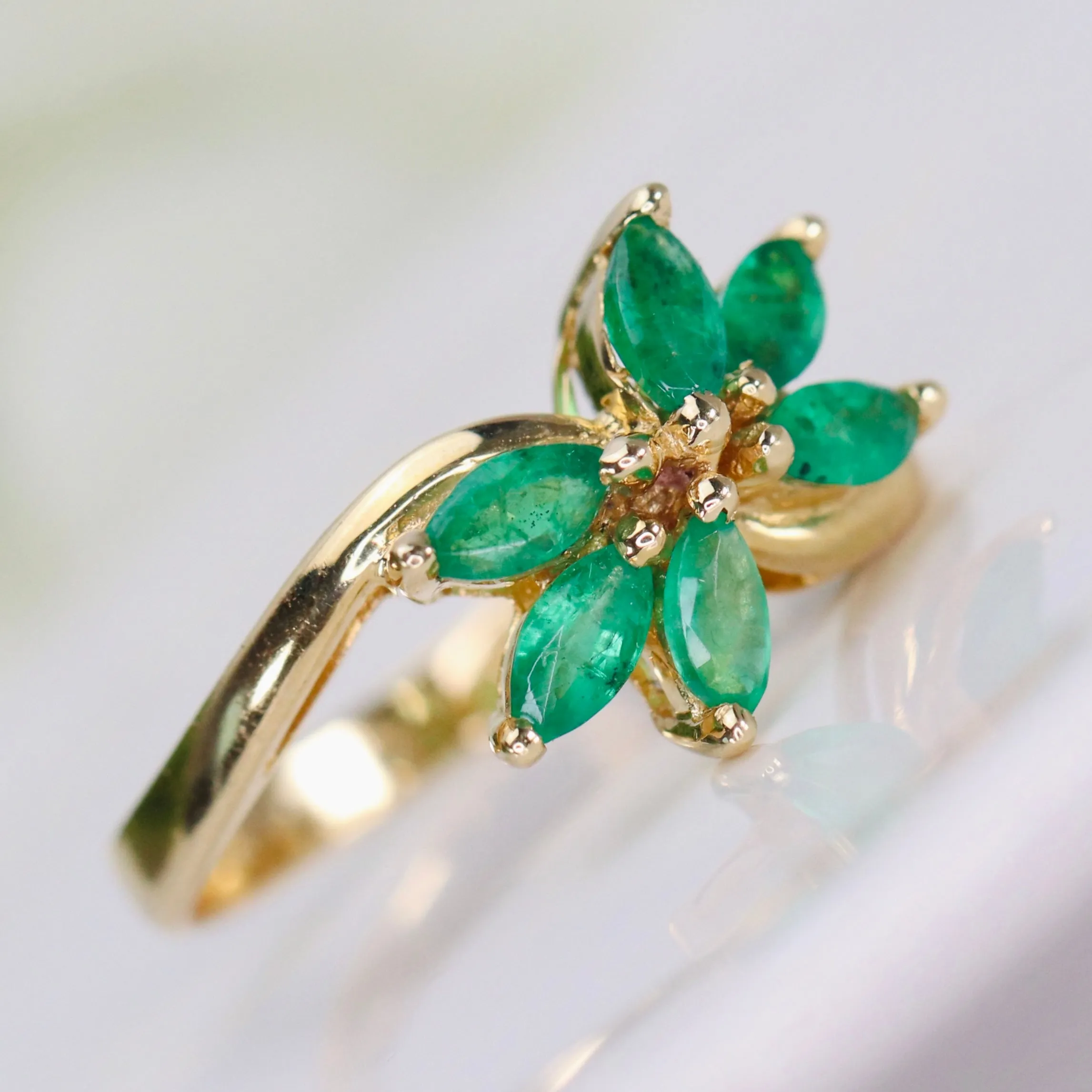 Vintage emerald twisted cluster ring in 14k yellow gold