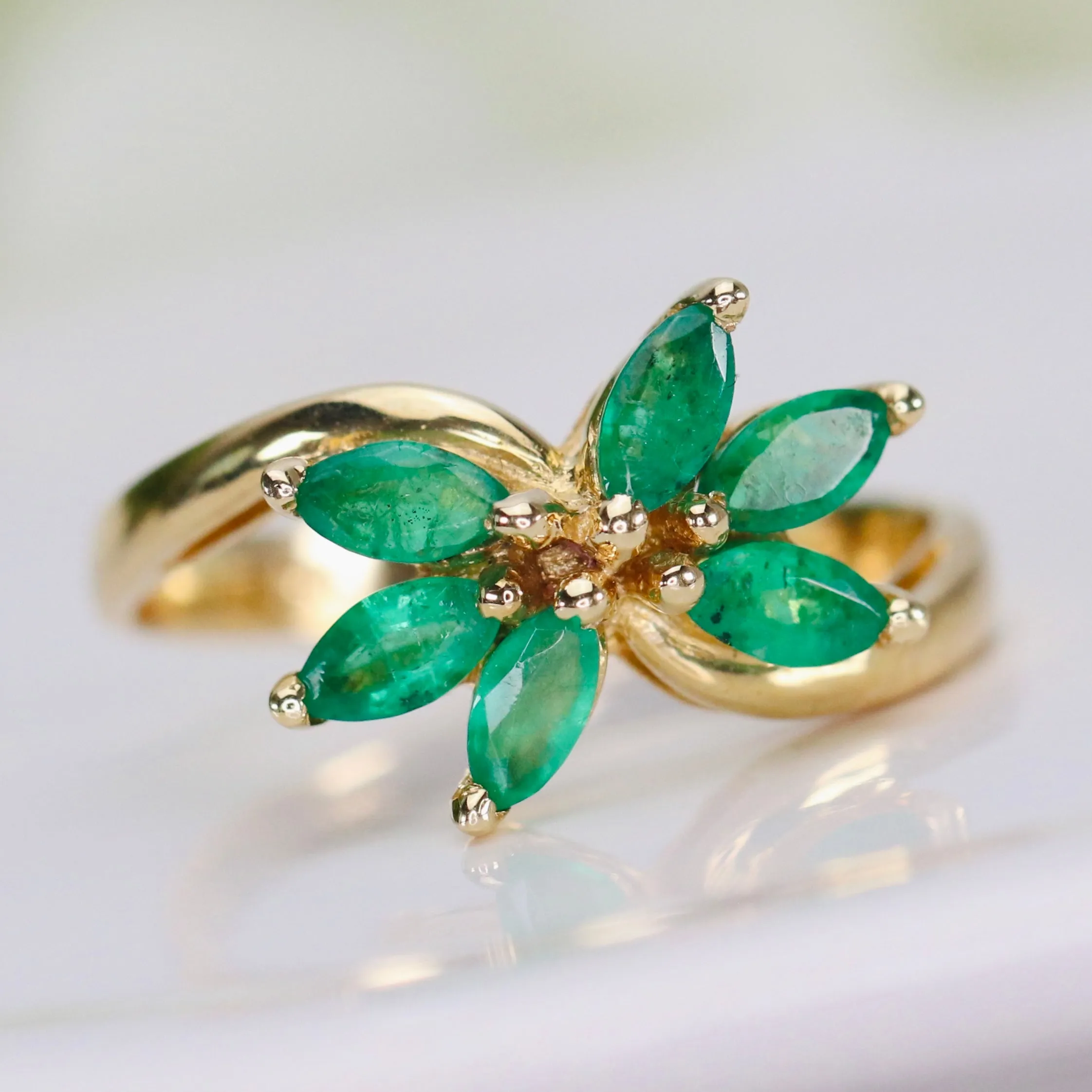 Vintage emerald twisted cluster ring in 14k yellow gold