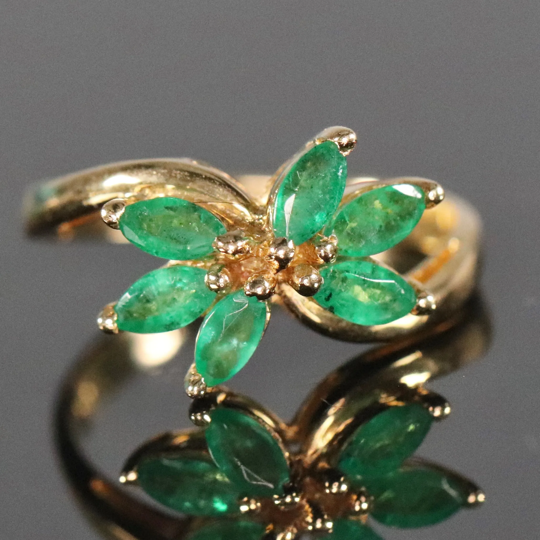 Vintage emerald twisted cluster ring in 14k yellow gold
