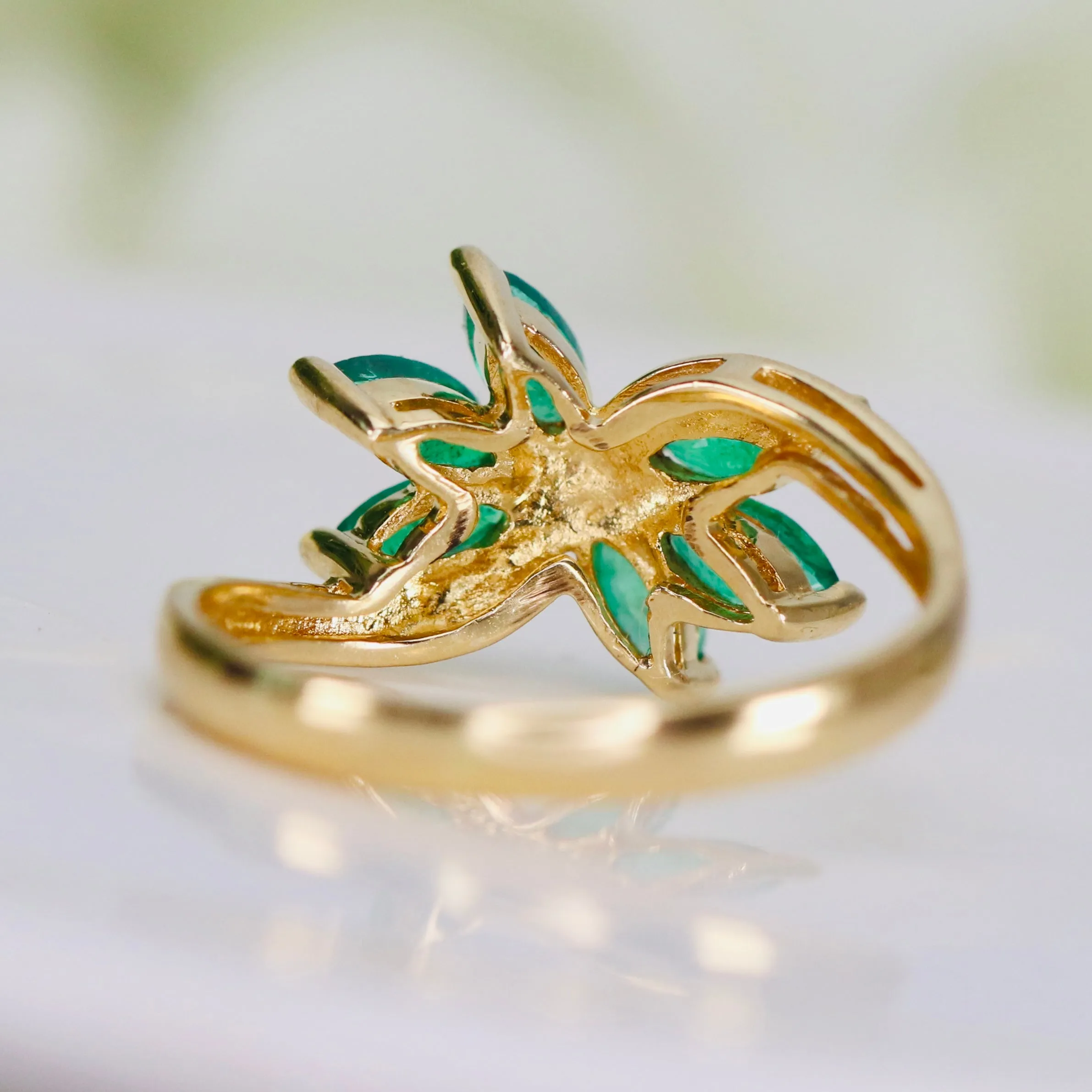 Vintage emerald twisted cluster ring in 14k yellow gold